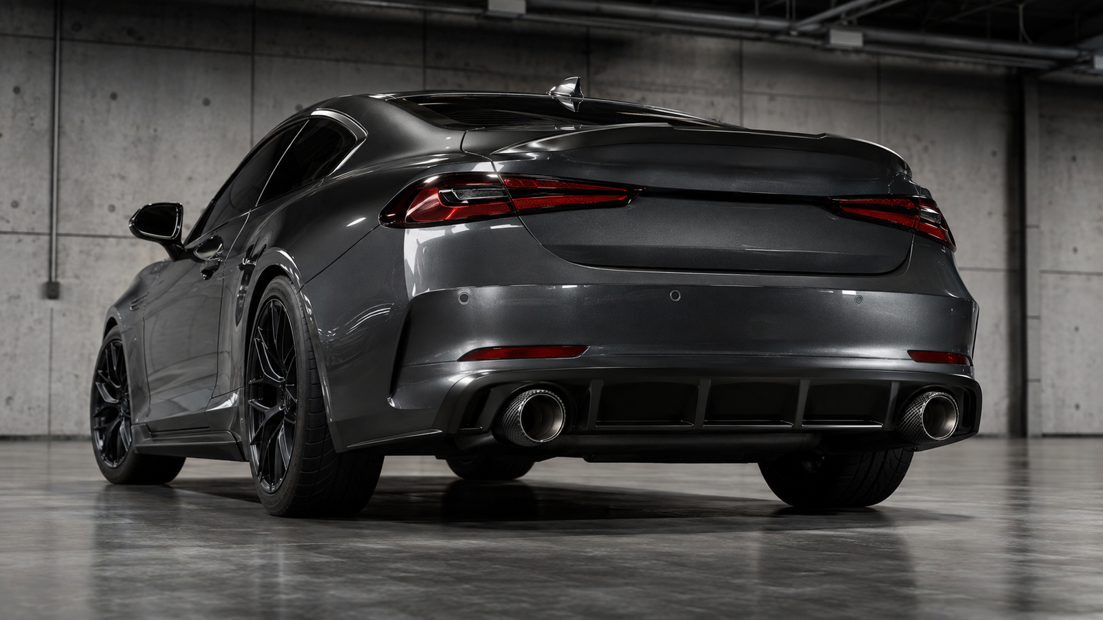 Twin carbon fiber exhaust tips fitted to a dark performance coupe