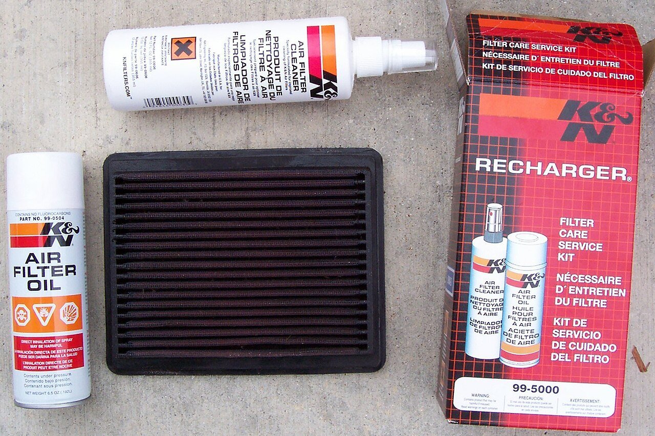 Real photograph of a reusable automotive air filter and service kit