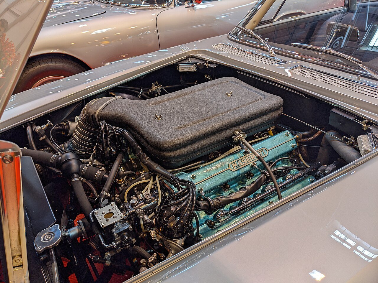 Real photograph of a Maserati engine fitted with a large air filter