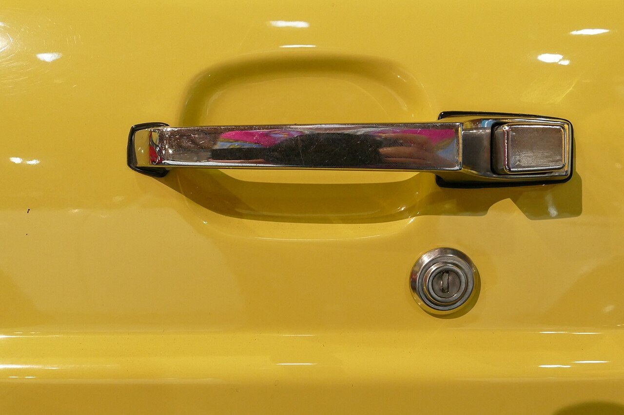 Reference photograph of Door handle of a Mazda car 01