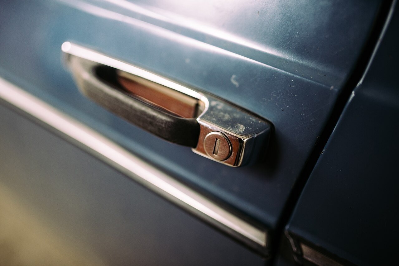 Reference photograph of Close-up of a car door handle