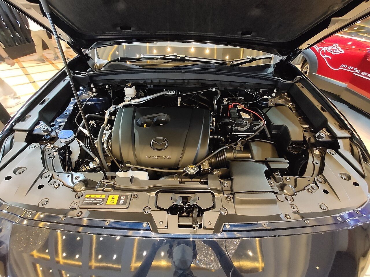 Reference photograph of Engine bay of Mazda CX-5 during GIIAS 2026 in Bandung 20260911 180106