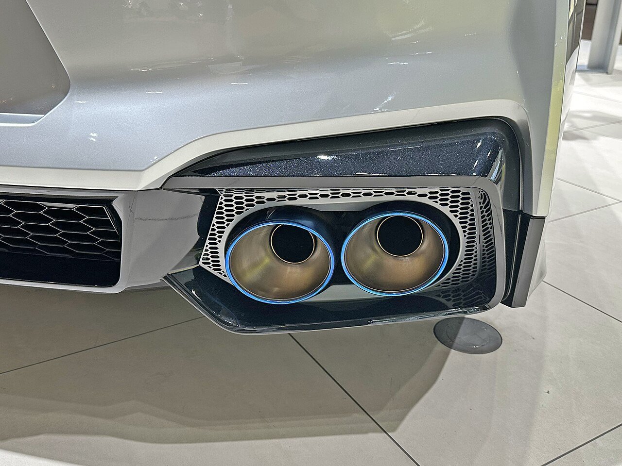 Real photograph of quad exhaust outlets on a Nissan GT-R