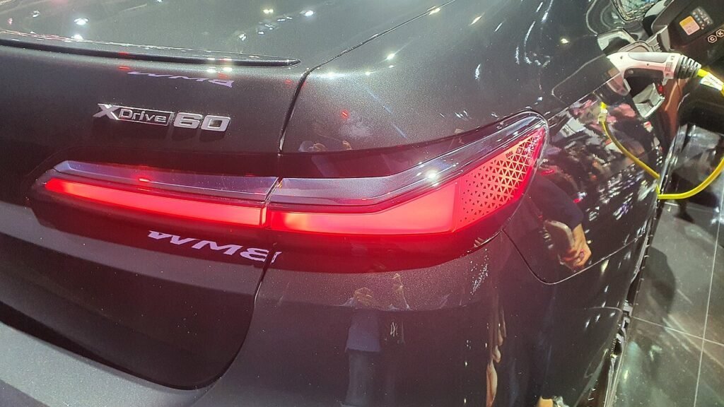 Real close-up photograph of a BMW 7 Series G70 rear lamp