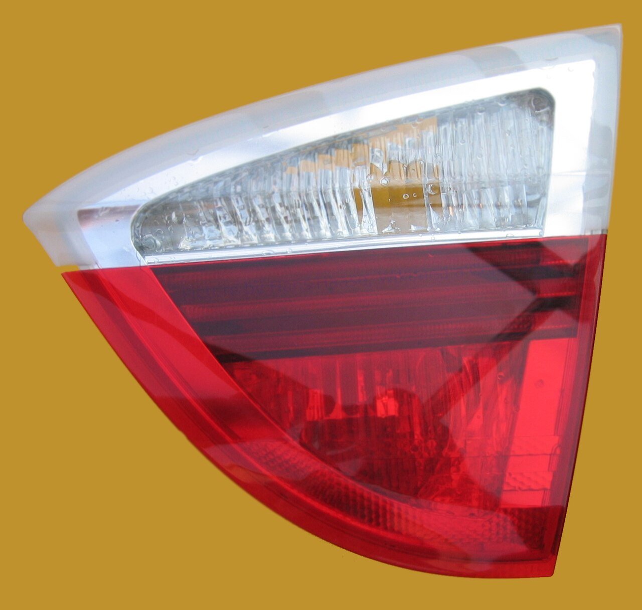Real photograph of a removed BMW E91 inner tail light