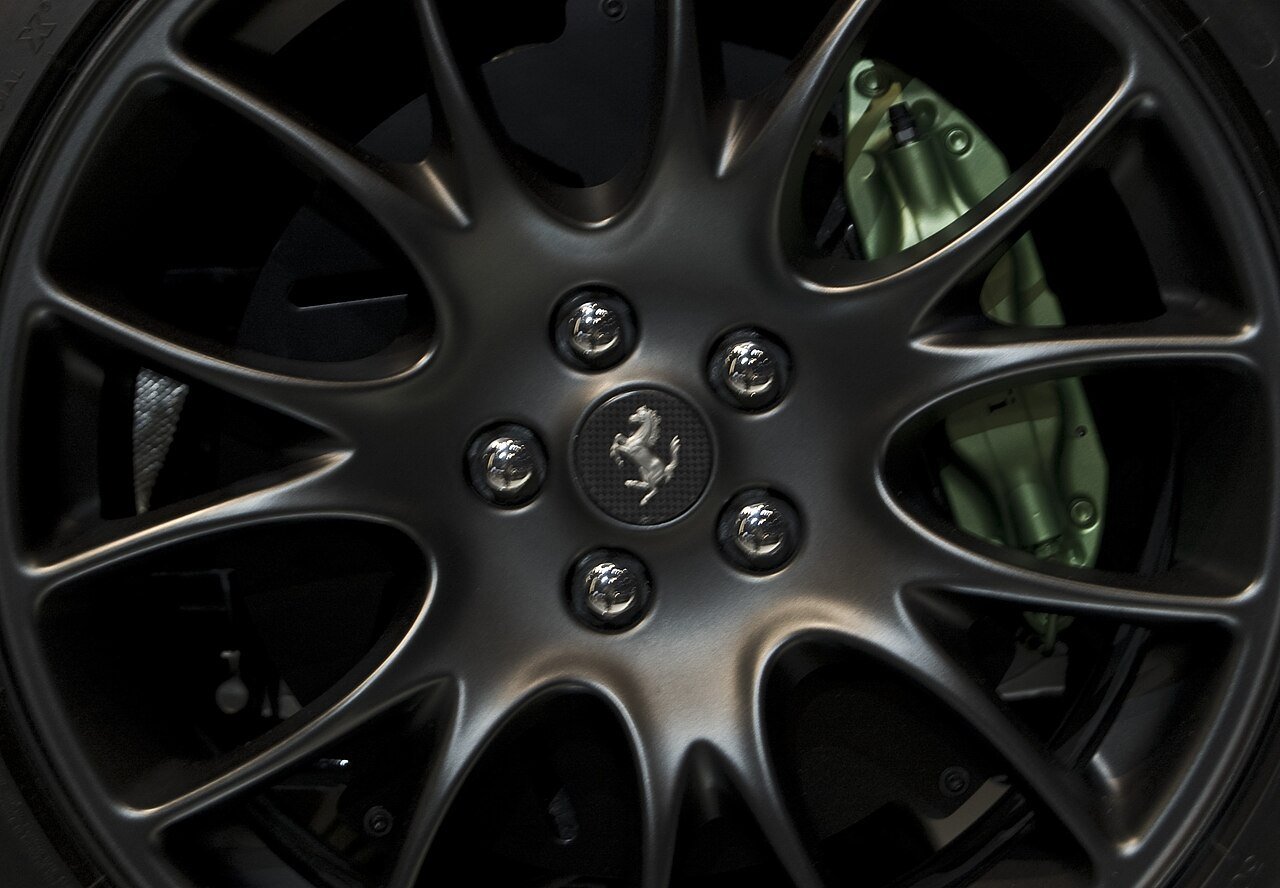 Real photograph of a Ferrari 599 HY-KERS alloy wheel and brake